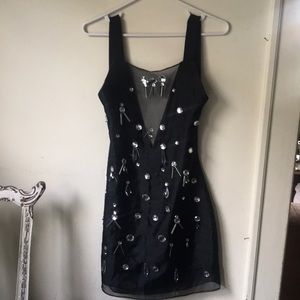 Badgley Mischka black, jeweled cocktail dress.